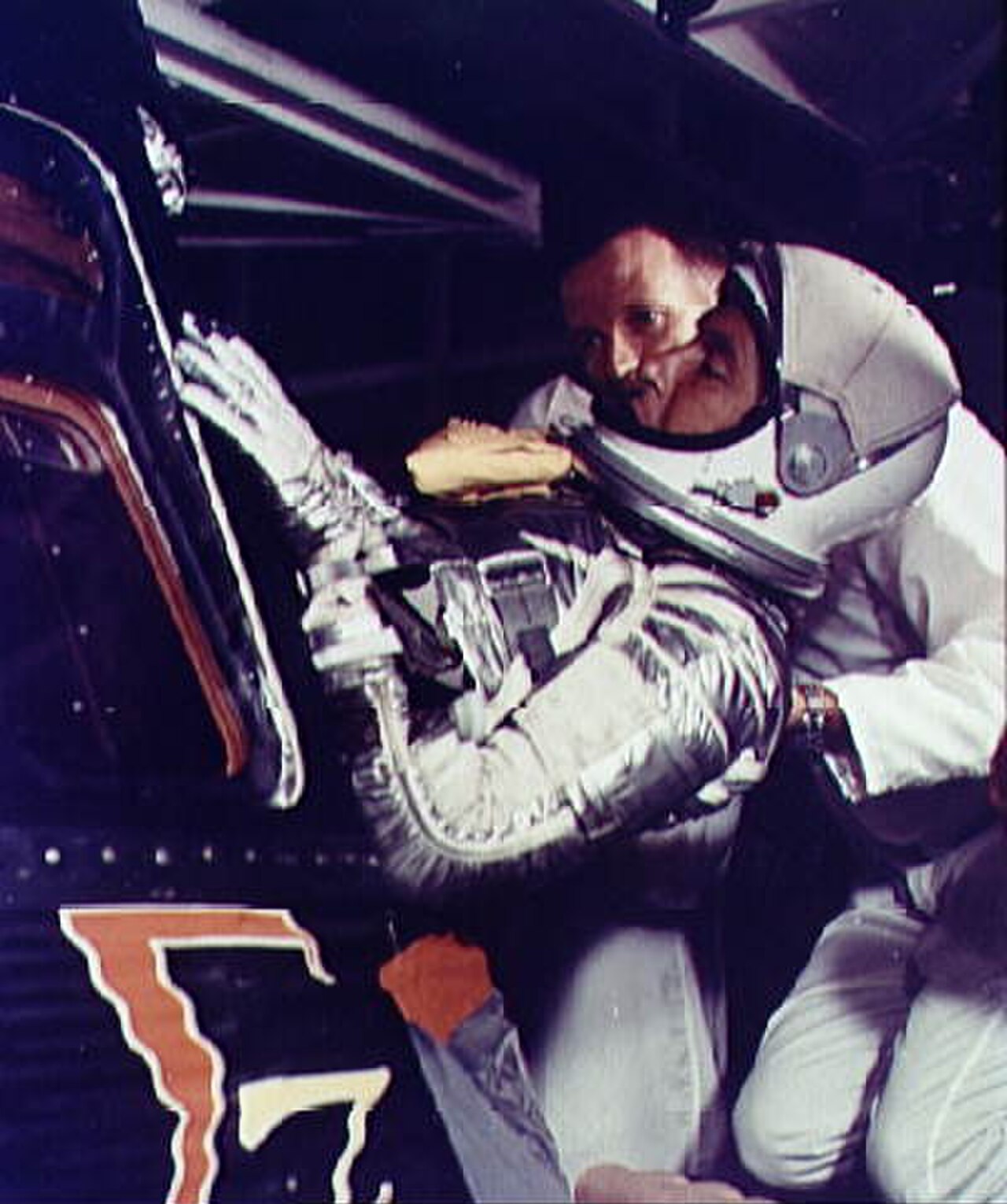 Wally Schirra entering the Sigma 7 Mercury capsule at Cape Canaveral
