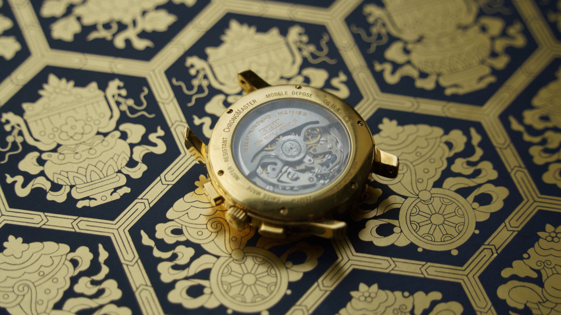 Gold Chronomaster on the wrist showing case thickness and sapphire crystal